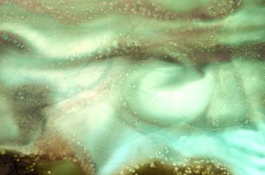 Yeşil tonlardaki çizgilerin soyut sanat arkaplanı