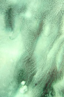 Yeşil kuru lekelerin soyut sanat arkaplanı