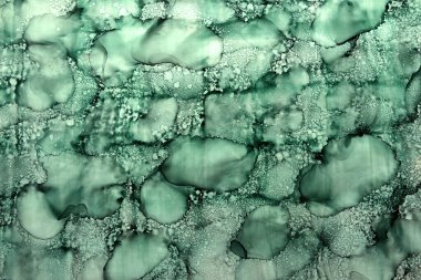 Kuru damlaları yeşil renkte lekelerin sanat arkaplanı