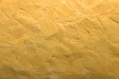 alçı sanat arka planında sarı kum rengi