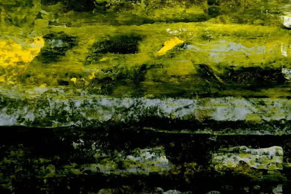 Sarı yeşil fırça darbelerinin soyut arkaplanı