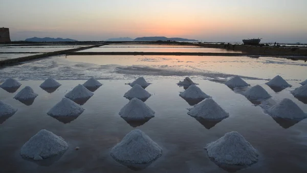 The Saline di Trapani and Paceco oriented nature reserve is a protected natural area in Sicily where the ancient sea salt extraction activity takes place.