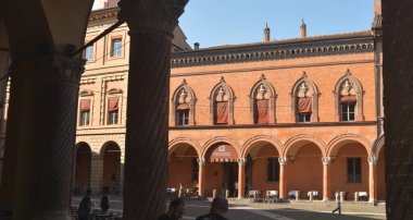 Piazza Santo Stefano is a well-known and picturesque square in Bologna with the Basilica di Santo Stefano consisting of seven churches of San Petronio.  clipart