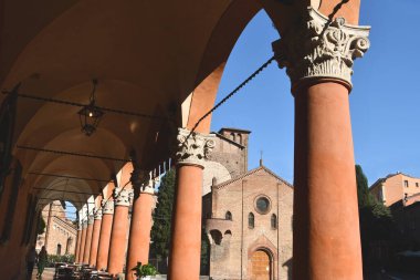 Piazza Santo Stefano is a well-known and picturesque square in Bologna with the Basilica di Santo Stefano consisting of seven churches of San Petronio.  clipart