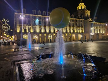 Turin is home to the ATP tennis finals, and Piazza Castello is brightened by giant balls accompanying the event. clipart