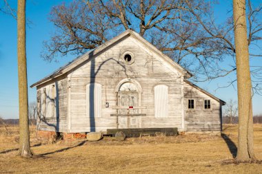 Abandoned one room schoolhouse in rural Bureau County, Illinois.