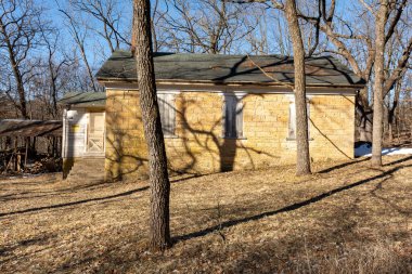 Old abandoned one room limestone built schoolhouse in Adeline, Illinois.
