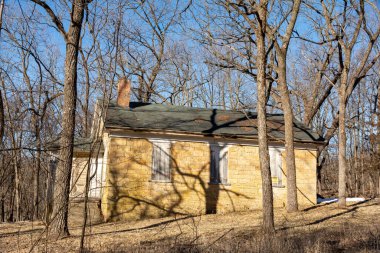 Old abandoned one room limestone built schoolhouse in Adeline, Illinois.