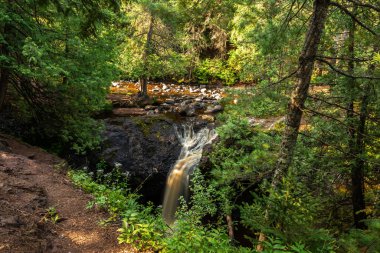 Snake Pit Falls in the morning light.  Amnicon Falls State Park, South Range, Wisconsin, USA. clipart