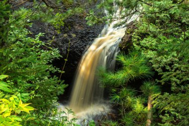 Snake Pit Falls in the morning light.  Amnicon Falls State Park, South Range, Wisconsin, USA. clipart