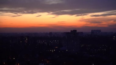 Ukraine, Kiev, January 20, 2023. Panorama of the city during sunset, lights out, blackout. 