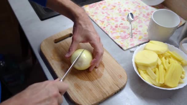 Mans Hands Cut Onions Half Cutting Board Kitchen — Video Stock