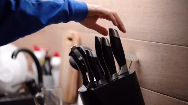 Mans Hand Takes Large Kitchen Knife Set Knives Standing Kitchen — Stock Video