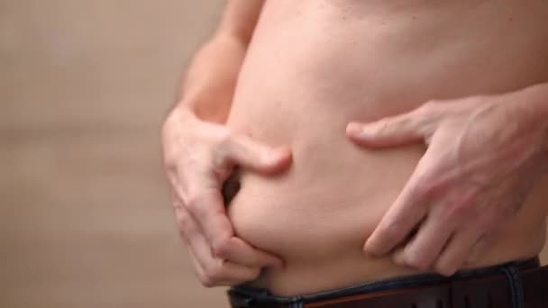 Man Hits Himself Stomach Takes Folds Fat His Stomach Excess — Stockvideo