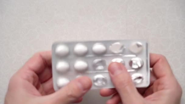Mens Hands Take White Pill Out Blister Put Table Top — Vídeo de stock