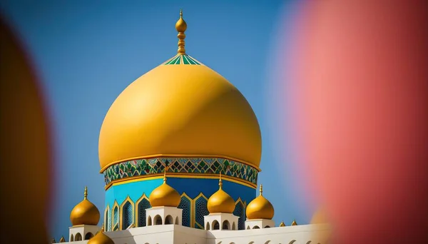 a large yellow and blue dome on top of a white and blue building with gold domes on it\'s sides and a blue sky in the background.