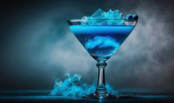 a blue liquid in a glass with ice on the rim.