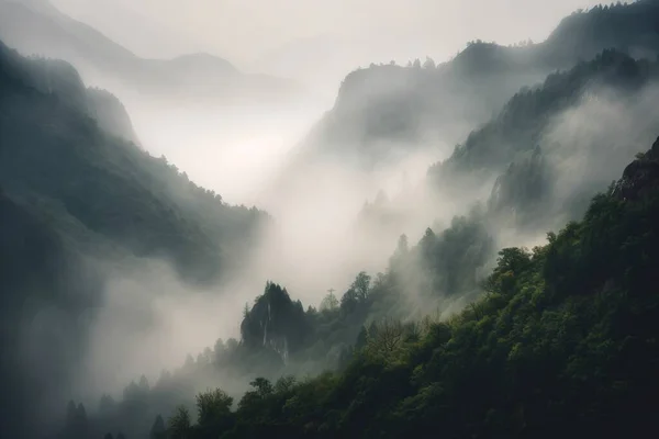 a foggy mountain with trees and mountains in the background.