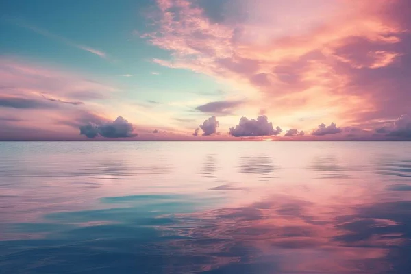 a beautiful sunset over the ocean with clouds in the sky and water reflecting off the surface of the water and the sun reflecting off the horizon.