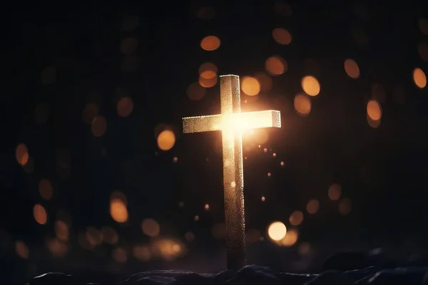 a cross with a light shining on it in the dark night sky with boke of light coming from the top of the cross and the cross.