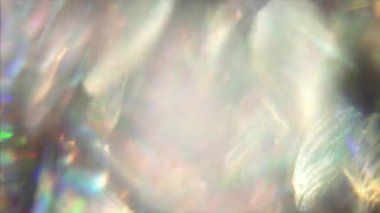 Hypno dinamik fütüristik, zarif, pırıl pırıl bir arka plan. Işık sızıyor. Şık bir bokeh. 4k görüntü.