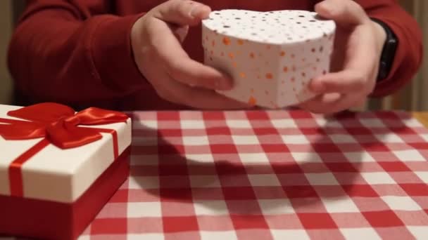 Man Gives Gift Heart Shaped Box Anniversary Valentines Day Birthday — Stock video