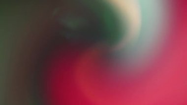 Colorful bokeh nostalgic psychodelic holographic background spiral moving in circle to center funnel. 4k video for creative use. 