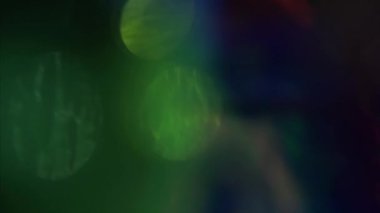 Colorful bokeh nostalgic dreamy shimmering background. 4k VFX for trending overlay. 