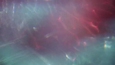 Blured blue, red, purple, silver lights. Christmas and festive decoration. Defocused bokeh holiday abstract background. High quality 4k footage.