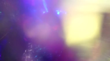 Multicolored holographic highlights, bokeh, abstract light flashes and transformations for web design and tv and web screensavers.