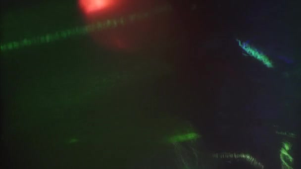 マルチカラーのネオンサイバーパンクの夢のホログラフィックな背景 ビデオの光漏れ — ストック動画