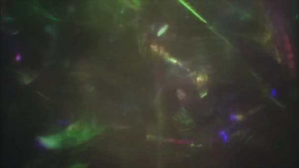Colorful Light Beams Passes Clear Glass Footage Surrealistic Shimmering Overlays — Video