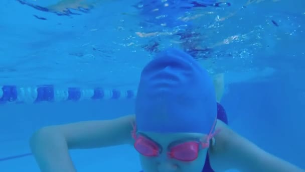 Girl Swims Underwater Pool Slow Motion Underwater Human Child Learns — Stock Video