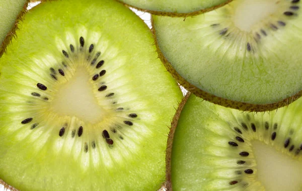 slices of kiwi fruit. juicy fresh fruit close-up. Kiwi Background