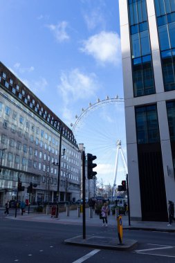 London United Kingdoms January 15 2023. View of the London eye between buildings near River Thames