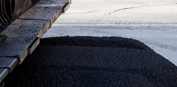 stock image bluish-black granular asphalt on the ground outdoors