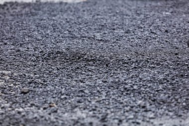 Asfalt hazırlığı, düz beton taşlar.