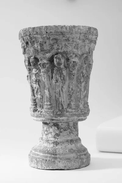 black and white stone chalice, space for text