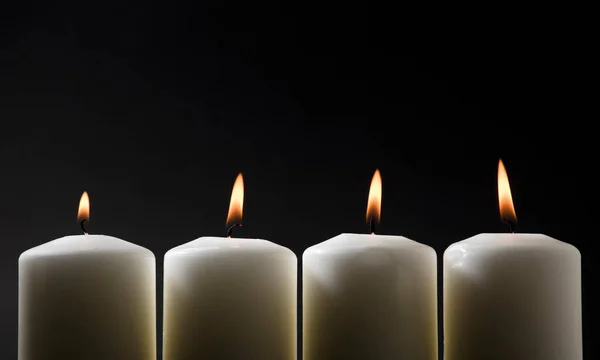 Four Burning Candles Black Background Family — Stock Photo, Image