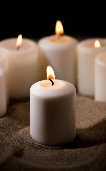 Bullying Concept Composed Group Lit Candles Sand Black Night Background Royalty Free Stock Photos