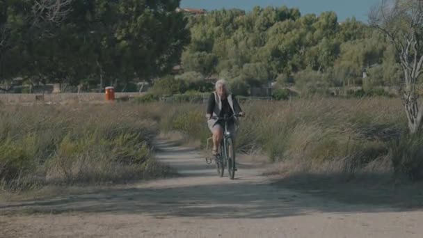 Woman Rides Bike Slow Motion High Quality Footage — Video