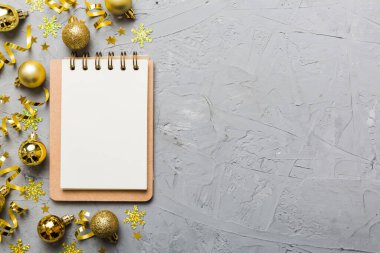 Christmas blank greeting card mock-up scene. Creative layout made of Christmas tree branches and paper card note. Flat lay. Nature New Year concept.