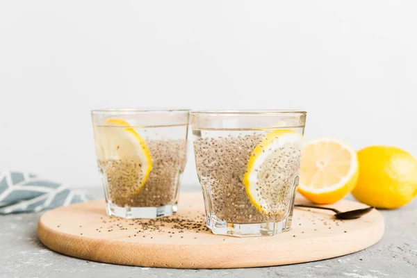 stock image Healthy breakfast or morning with chia seeds and lemon on table background, vegetarian food, diet and health concept. Chia pudding with lemon.