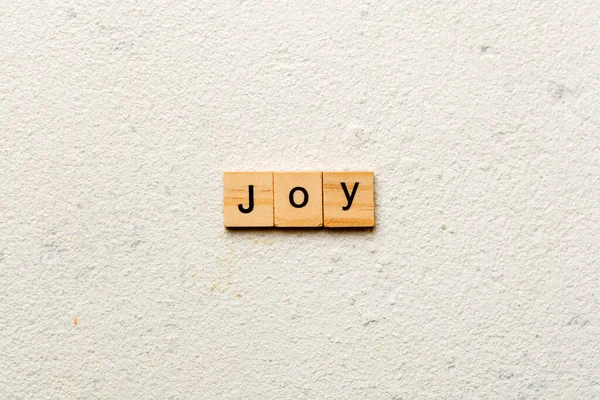 Joy Word Written Wood Block Joy Text Cement Table Your — Stock Photo, Image