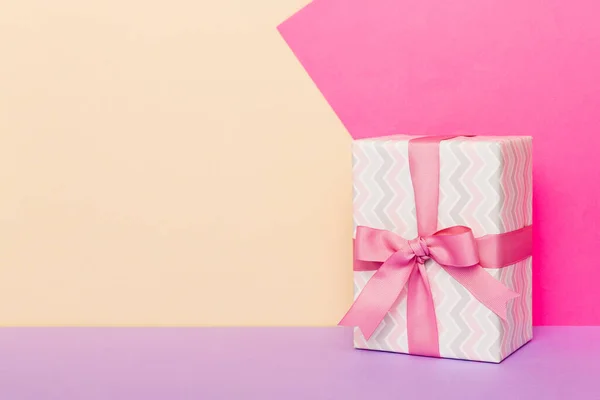 Holiday Paper Present Tied Pink Ribbon Bow Top View Copy — Stock fotografie