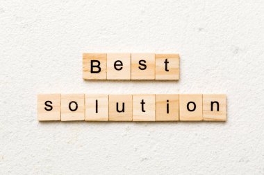 best solution word written on wood block. best solution text on table, concept.