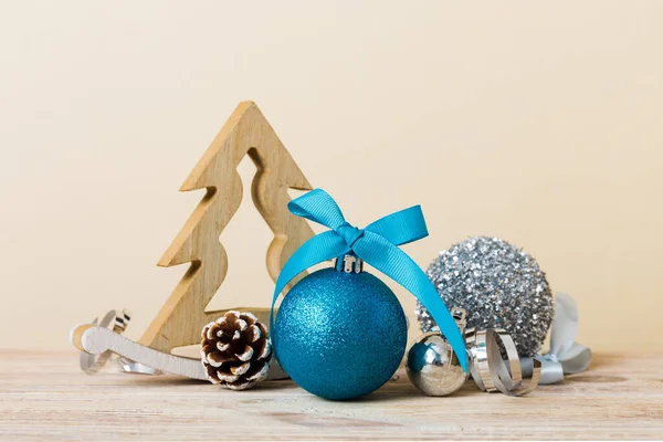 Christmas Ball Decorative Wooden Tree Colored Background Decoration Bauble Ribbon — Stok fotoğraf
