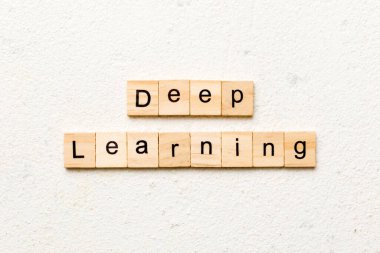 Deep Learning word written on wood block. Deep Learning text on table for your desing, concept.
