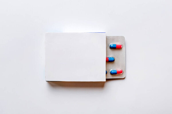 Blank White Product Package Box Mock-up. Open blank medicine drug box with blister top view.