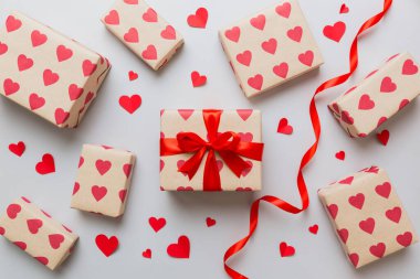 Creative gift box with decorations for the holiday, top view. Birthday and valentine present.